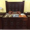 Carved hardwood and upholstered bed set