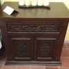 Carved hardwood and upholstered bed set